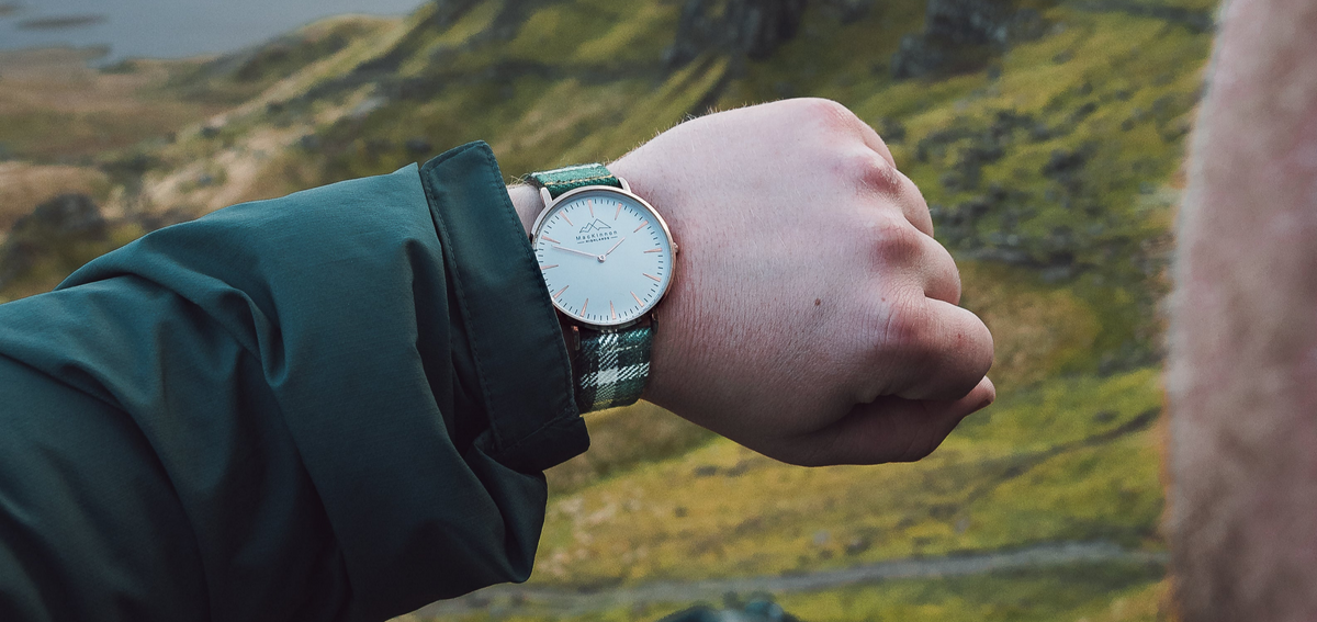 MacKinnon watch with a colourful tartan strap